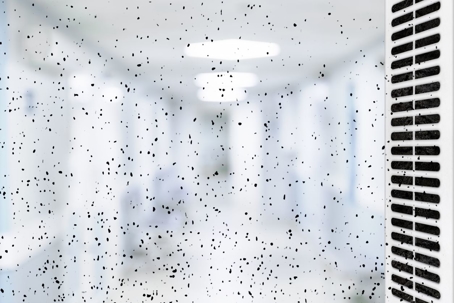 Dust or dirt from the ventilation grill in the office. Room pollution concept. Allergic pathogen.