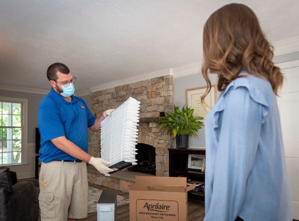 Our Technician Working on a Air Conditioner