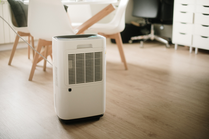 A modern dehumidifier unit in a home. | Blazer Heating, Air, and Plumbing